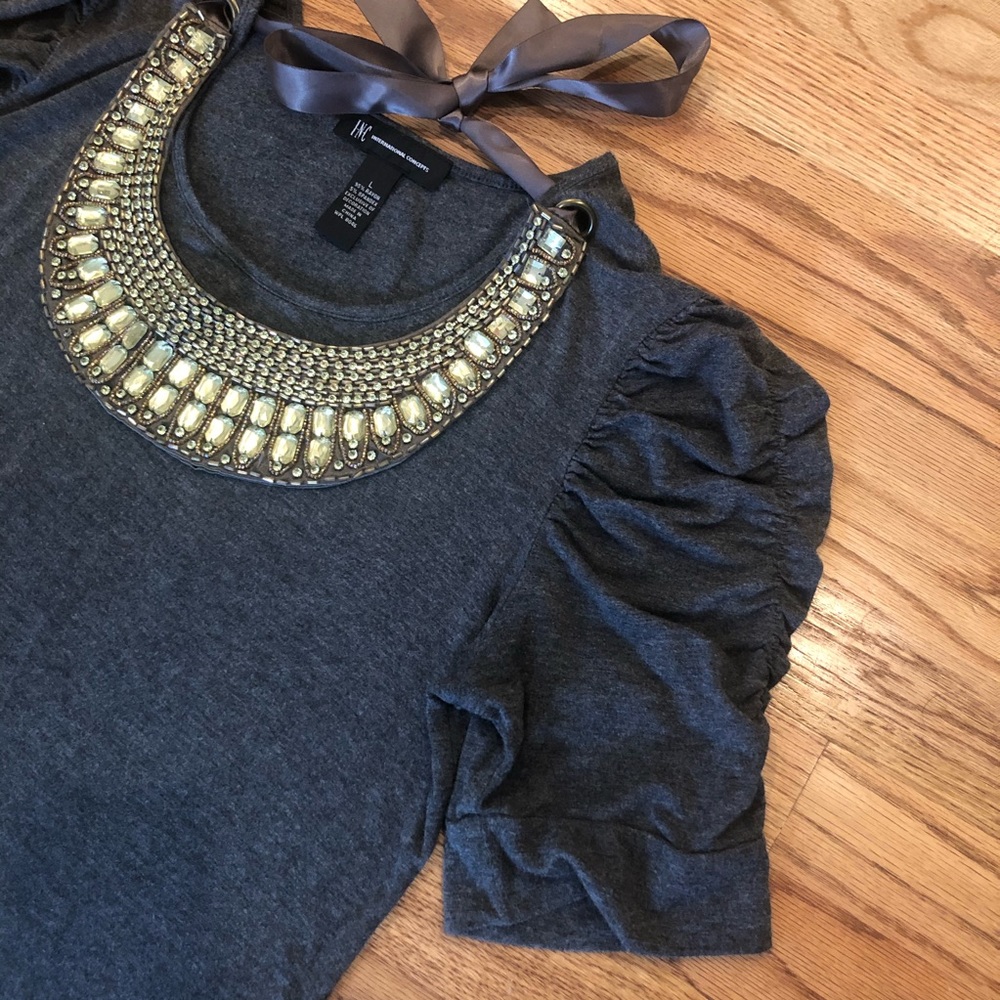 INC top w/ adorned necklace.